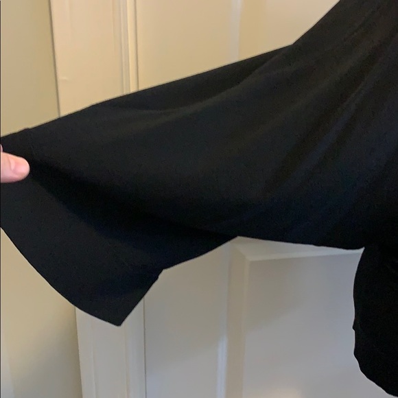 Woman’s fitted sweater with decorative neckline - Picture 7 of 8